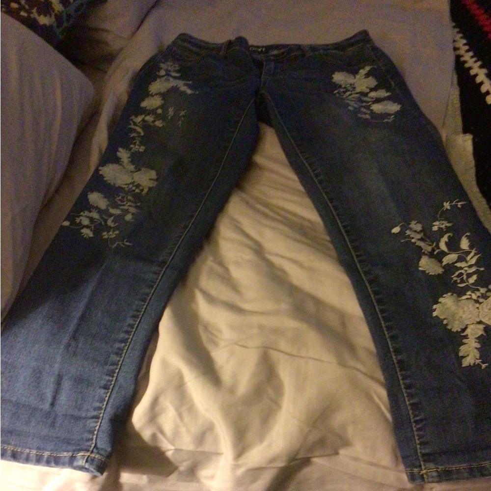 Medium washed embroidered jeans, size 4.